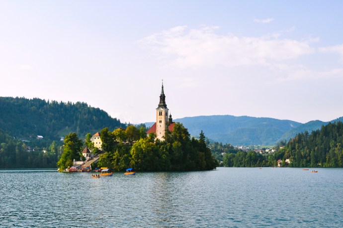 Chapel with steeple on a small island in a lake