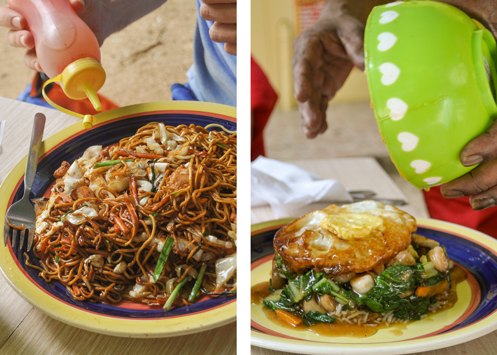 Left: a plate of fried noodles; Right: a plate of rice with chopped vegetables and an overturned fried egg