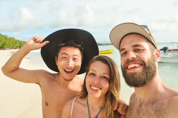 A group of friends having fun on a tropical beach
