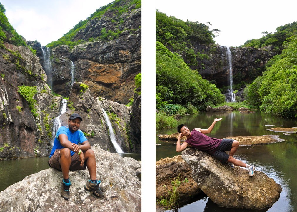 Young men posing in front of waterfalls