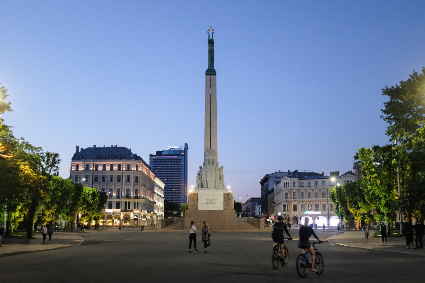 View of Riga's Freedom Monument at dusk
