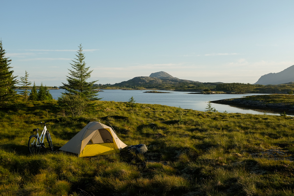 Tent and bicycle out in the wilderness