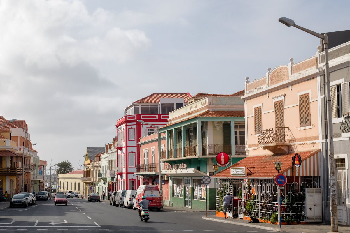 A street with colonial-style buildings painted in bright colors