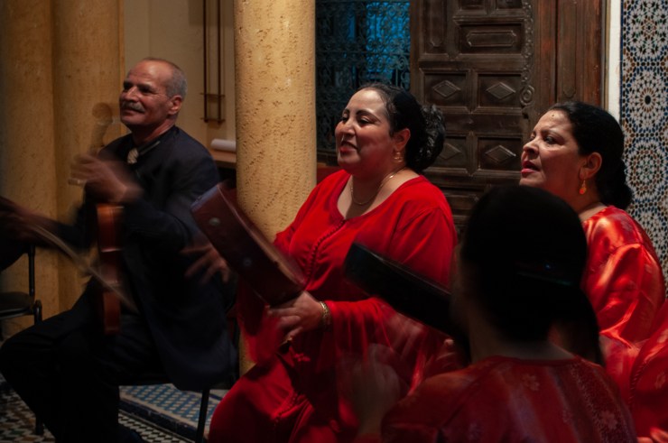 A group of musicians performing traditional Moroccan music