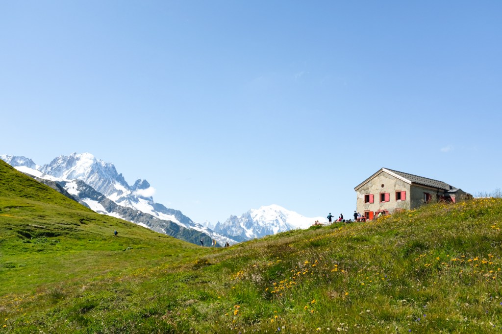 A mountain refuge by a glacier