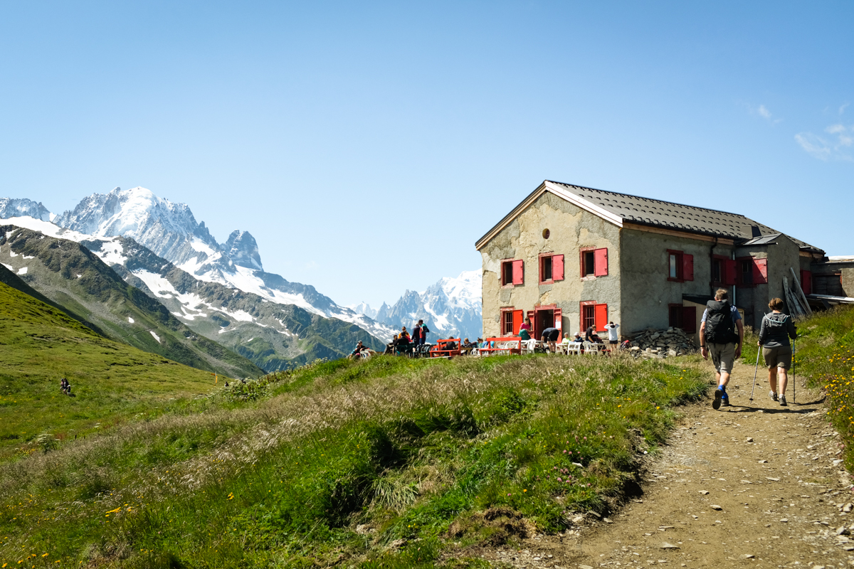 Hikers approach a mountain refuge