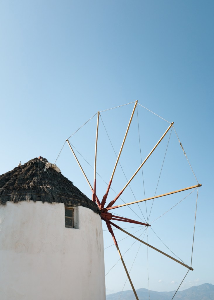 A closeup of a wooden windmill