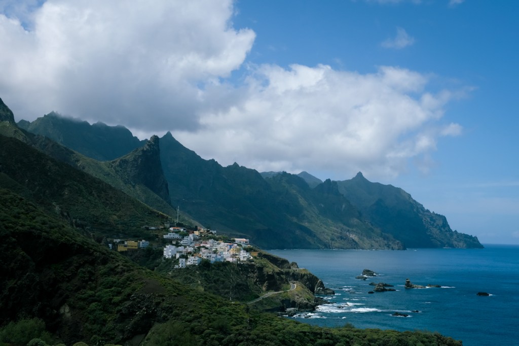 View of a mountain village by the sea