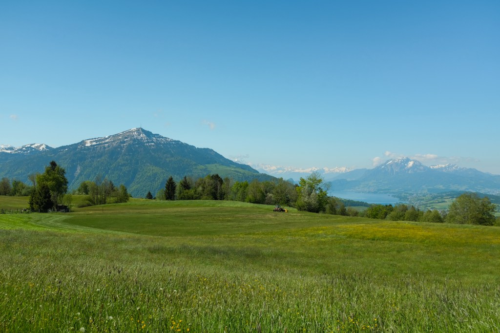 Farmland, lake, and mountains