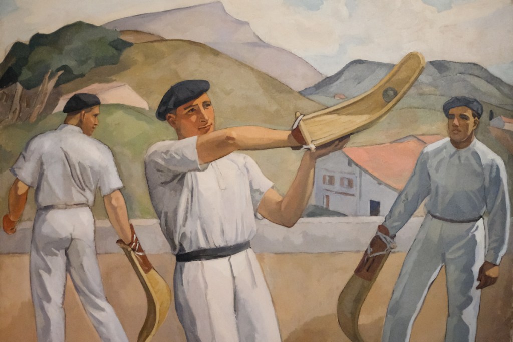 Painting on display inside of the Musee Basque displaying pelota, a ball sport played with the bare hand or with a racket