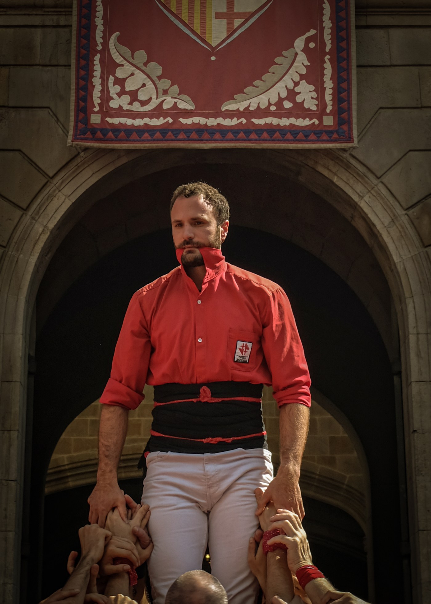 Catalan castellers constructing a human pillar